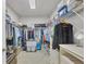 Spacious walk-in closet with ample shelving and hanging space for organized storage at 16273 Coconut Palm Dr, Port Charlotte, FL 33953