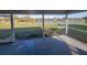View from the screened in patio showcasing a tranquil pond at 172 Coblentz St, Port Charlotte, FL 33954