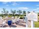 Fire Pit Rules sign stating hours of operation from 8:30 am to 10:00 pm at 19241 Serafina St, Venice, FL 34293