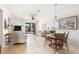 Bright living room with access to outdoor patio and views at 19241 Serafina St, Venice, FL 34293