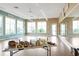 Bright yoga studio featuring hardwood floors, natural light, and serene atmosphere at 19241 Serafina St, Venice, FL 34293