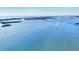 Expansive aerial view showcasing the beautiful coastline and shimmering turquoise waters at 1960 Mississippi Ave, Englewood, FL 34224