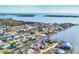 Beautiful aerial view of a coastal community with waterfront homes and intersecting canals at 1960 Mississippi Ave, Englewood, FL 34224