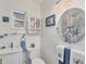 Well-lit bathroom with nautical themed decor, modern fixtures, and a clean, updated design at 1960 Mississippi Ave, Englewood, FL 34224