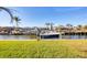 Home with private boat dock and lift, offering direct access to the open water at 1960 Mississippi Ave, Englewood, FL 34224