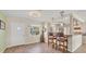 Bright kitchen and breakfast bar area featuring warm wood cabinets at 1960 Mississippi Ave, Englewood, FL 34224