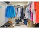 Walk-in closet with clothing racks and shoes, offering organized storage space at 20110 Ragazza Cir # 102, Venice, FL 34293