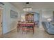 Traditional dining room featuring elegant chandelier, classic wood furniture, and display cabinet at 20110 Ragazza Cir # 102, Venice, FL 34293