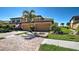 Charming two-story townhome with an attached garage, and lush landscaping at 20110 Ragazza Cir # 102, Venice, FL 34293