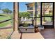 Charming patio featuring a wicker cart and views of meticulously maintained landscaping at 20110 Ragazza Cir # 102, Venice, FL 34293