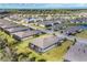 Spacious homes with mature trees and a lake nearby give a peaceful and serene setting at 2088 Bonito Way, Port Charlotte, FL 33953