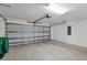 Spacious two-car garage featuring an automatic door and ample room for storage at 2088 Bonito Way, Port Charlotte, FL 33953