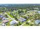 Beautiful aerial view of the community, showcasing the surrounding greenery and neighborhood at 224 Pine Glen Ct, Englewood, FL 34223