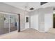 Bright dining area with sliding glass doors to the outdoor patio and tiled floors at 224 Pine Glen Ct, Englewood, FL 34223