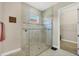 Modern shower with glass enclosure and tile surround at 23781 Waverly Cir, Venice, FL 34293