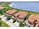A look at luxury homes, each with their own garage, near a tranquil waterfront at 4624 Club Dr # G201, Port Charlotte, FL 33953
