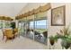 Well-lit dining area with a large window offering beautiful views of the water at 4624 Club Dr # G201, Port Charlotte, FL 33953