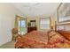 Bedroom with furniture, a dresser with a large window overlooking the waterfront at 4624 Club Dr # G201, Port Charlotte, FL 33953