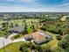 Gorgeous aerial shot displaying the property boundaries, home, and well-maintained lawn at 48 Par View Ct, Rotonda West, FL 33947