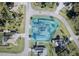 Aerial view of a property with a large lot and a pool with property lines clearly marked at 5262 Weatherton St, North Port, FL 34288