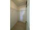 Small walk-in closet perfect for storage of a limited collection of clothing and accessories at 5262 Weatherton St, North Port, FL 34288