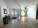 Inviting entryway with neutral tile flooring, double doors, and space for console table at 5262 Weatherton St, North Port, FL 34288