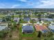 A desirable home with screened-in pool in a serene neighborhood near waterways at 59 Long Meadow Ln, Rotonda West, FL 33947