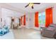 Bright dining area with a view of the open living space, tile flooring, and natural light at 59 Long Meadow Ln, Rotonda West, FL 33947