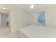 This bedroom features closet doors, carpeted floors, and a window for plenty of natural light at 7151 Cork Ln, Englewood, FL 34224