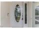 Close up of the front door with glass window at 7151 Cork Ln, Englewood, FL 34224