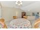 Open-concept living room with tile flooring at 7151 Cork Ln, Englewood, FL 34224