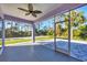 Relaxing outdoor lanai with scenic views and screened openings to enjoy nature at 7499 Ashtabula St, Englewood, FL 34224