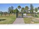 Gated community dog park with lush green space and play areas for furry friends at 8375 E Windbound Ct Ct, Sarasota, FL 34240