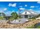 Community center showcasing lovely landscaping, an event pavilion, and charming details for an inviting atmosphere at 8375 E Windbound Ct Ct, Sarasota, FL 34240