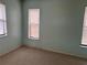 Light and airy bedroom with neutral walls and carpeted flooring at 9198 Crugar Ter, Englewood, FL 34224