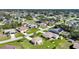 Aerial view of a residential neighborhood, showcasing well-maintained lawns and diverse home styles at 9423 El Campo Ave, Englewood, FL 34224