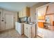 This bright laundry room features a wash basin and included washer and dryer at 9423 El Campo Ave, Englewood, FL 34224