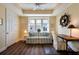 Bright office space with natural light, a decorative ship's wheel and stylish furnishings at 10310 Coral Landings Ct # 98, Placida, FL 33946