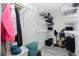 Organized walk-in closet with shelving and storage for clothes, shoes, and personal items at 1080 Panda Rd, Venice, FL 34293