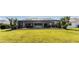 Expansive backyard features a screened lanai with a pool at 12 Sportsman Ter, Rotonda West, FL 33947