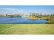 View of the backyard with a pond at 12 Sportsman Ter, Rotonda West, FL 33947