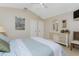 Well-lit bedroom featuring a queen-size bed, white dresser, and neutral walls at 12 Sportsman Ter, Rotonda West, FL 33947