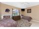 Cozy guest bedroom showcasing two twin beds, a ceiling fan, and window at 12 Sportsman Ter, Rotonda West, FL 33947