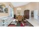 Dining area with a window, chandelier, and view into the kitchen area at 12 Sportsman Ter, Rotonda West, FL 33947