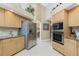 Modern kitchen with stainless appliances, granite counters, and lots of cabinet space at 12 Sportsman Ter, Rotonda West, FL 33947