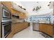 Gourmet kitchen with stainless steel appliances and ample counter space at 12 Sportsman Ter, Rotonda West, FL 33947