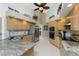 A spacious kitchen featuring oak cabinets and stainless steel appliances at 12 Sportsman Ter, Rotonda West, FL 33947