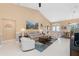 Bright and open living room showcasing neutral decor and stylish furnishings at 12 Sportsman Ter, Rotonda West, FL 33947