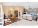 Spacious living room and dining area with tile flooring and high ceilings at 12 Sportsman Ter, Rotonda West, FL 33947