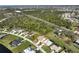 Wide aerial shot shows property with a circle around it, highlighting its location within the surrounding neighborhood at 127 White Marsh Ln, Rotonda West, FL 33947